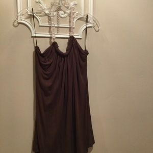 Soft cotton stretch t, with a jeweled neckline.